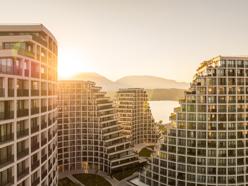 JA joubert architecture sculpts undulating lakefront district following sloped terrain in tirana