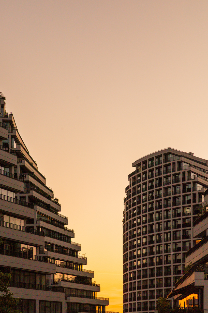 JA joubert architecture sculpts undulating lakefront district following sloped terrain in tirana