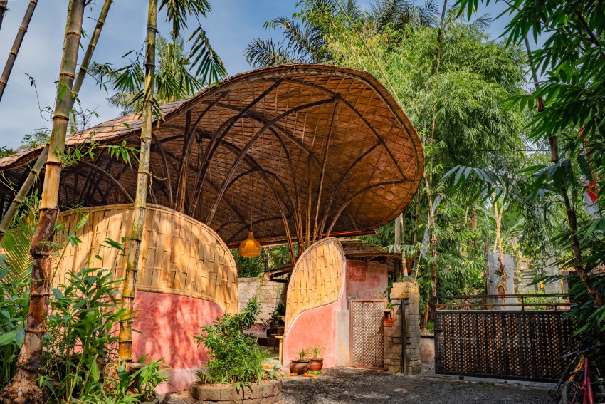 arched bamboo roof shades learning space in bali co-designed by students and mizzi studio