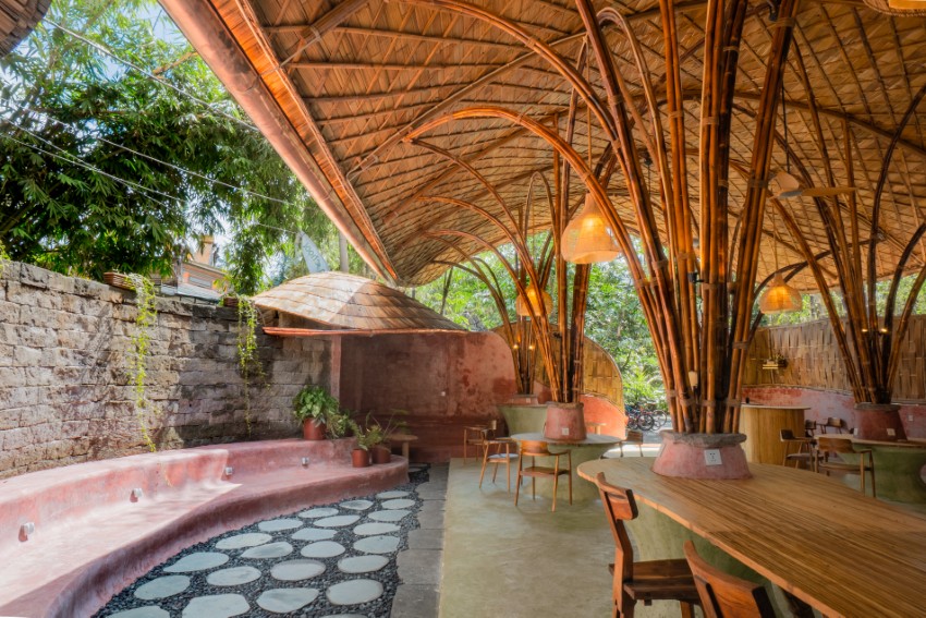arched bamboo roof shades learning space in bali co-designed by students and mizzi studio