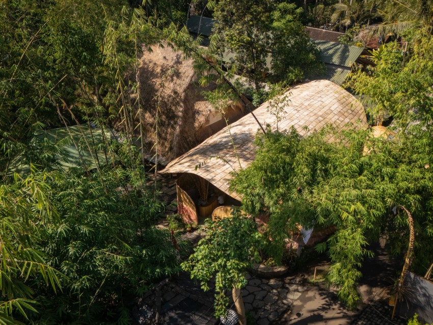 arched bamboo roof shades learning space in bali co-designed by students and mizzi studio