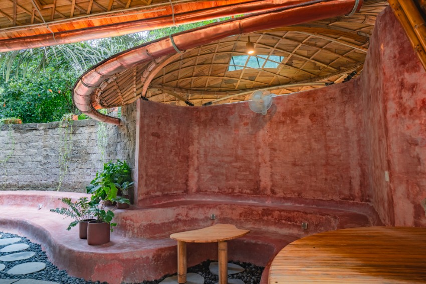 arched bamboo roof shades learning space in bali co-designed by students and mizzi studio