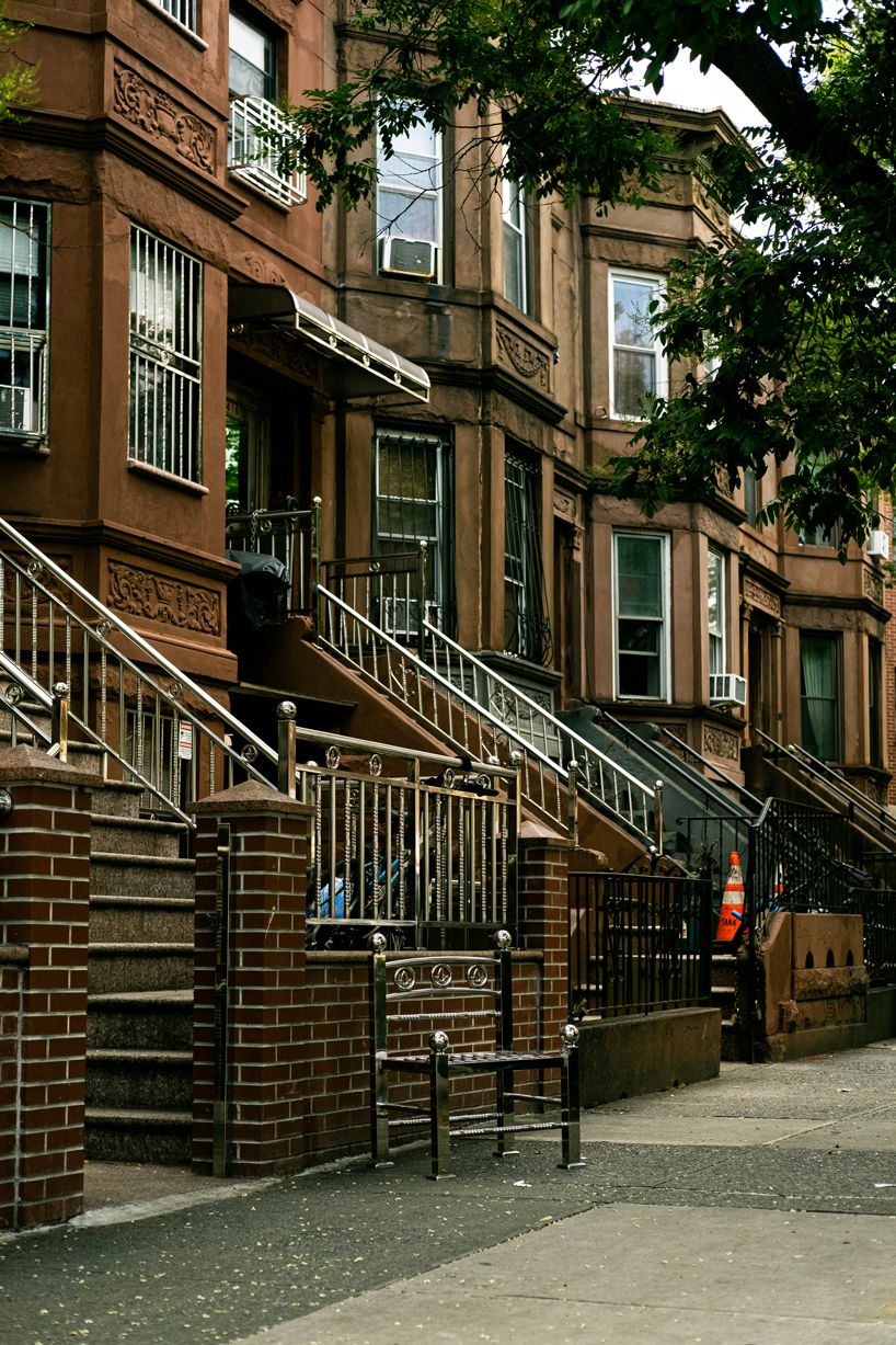 assembled from steel fence components, white picket chair challenges the american dream - 6