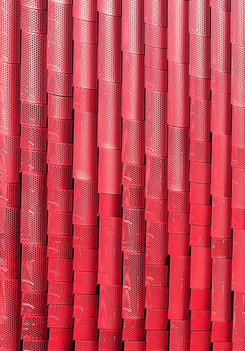 paperfarm reimagines kaohsiung restaurant with rippling red metal facade 6