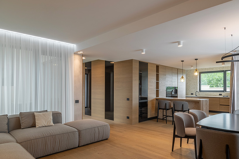 natural finishes pair with clean modern lines at amalia savu's house in romania