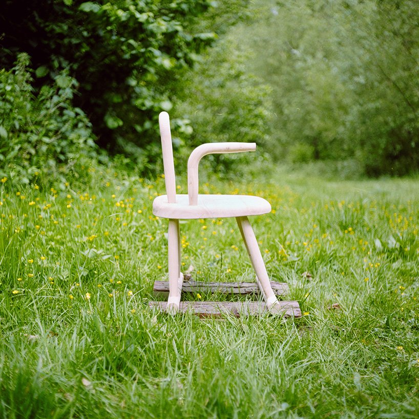 handcrafted from a fallen tree, sati rocking chair reflects on life, death and impermanence
