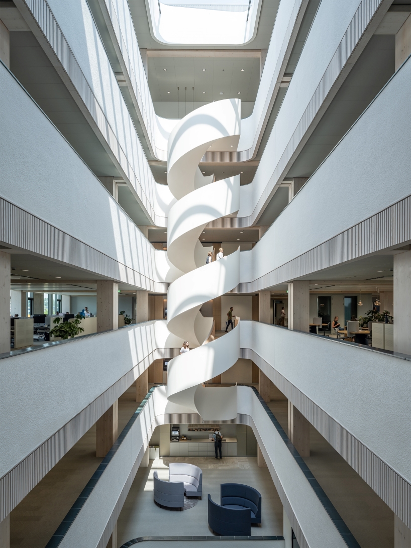 glazed ceramic tiles adorn hybrid timber office building's facade by team v in amsterdam