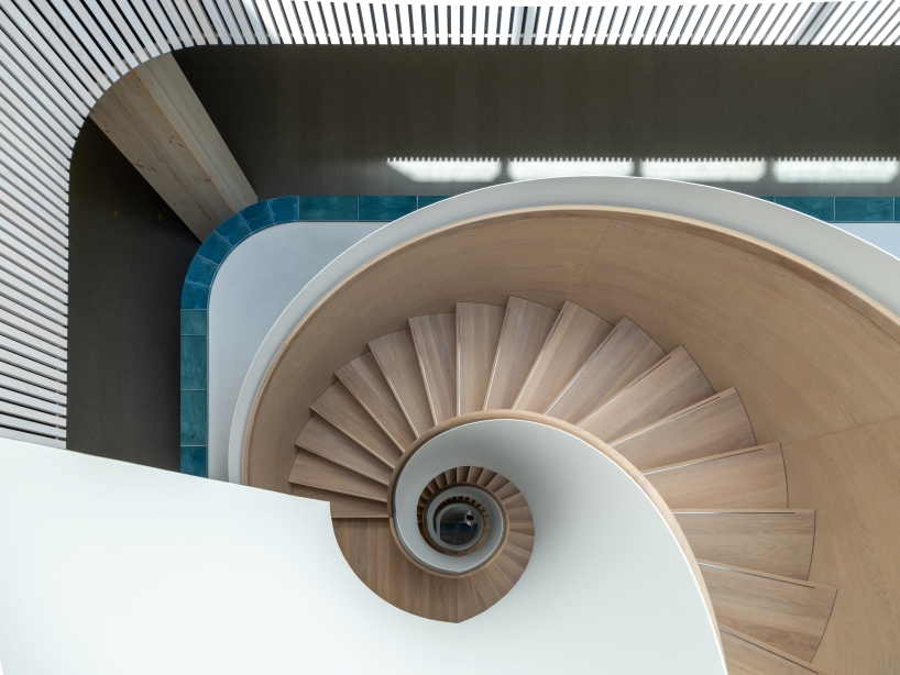 glazed ceramic tiles adorn hybrid timber office building's facade by team v in amsterdam