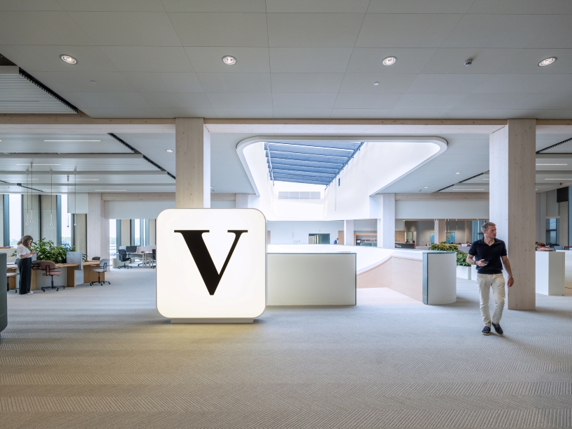 glazed ceramic tiles adorn hybrid timber office building's facade by team v in amsterdam