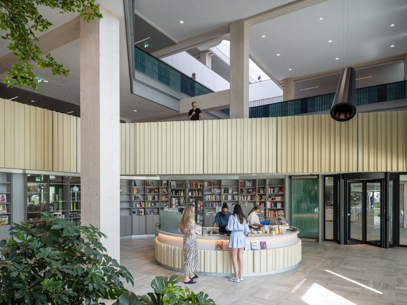 glazed ceramic tiles adorn hybrid timber office building's facade by team v in amsterdam