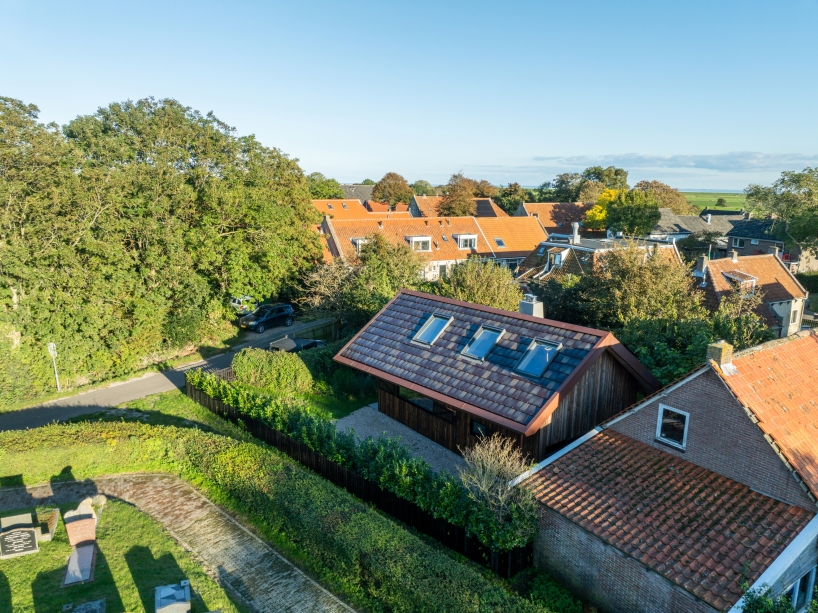 sustainable holiday home on dutch island blends japanese woodworking techniques with local heritage 11