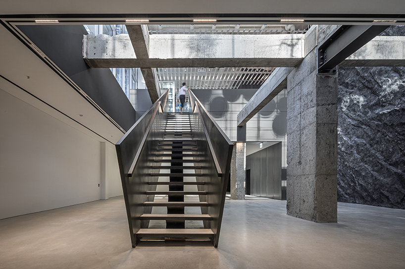 vibrant balloons nestle within metallic scaffolding atop seoul's playful urban hub by SSP