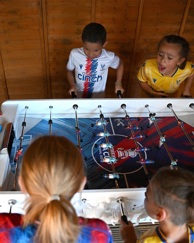 fans' inscriptions cover nigel VMU's six-foot sculptural cup trophy replicas for FA cup final