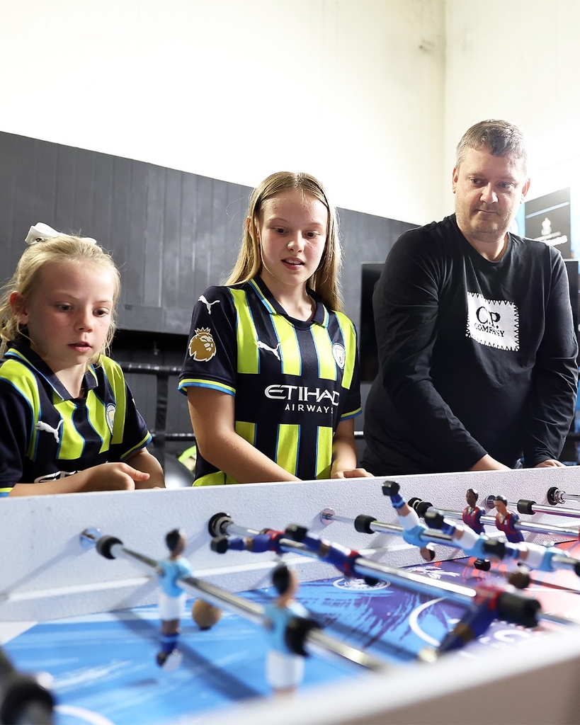 fans' inscriptions cover nigel VMU's six-foot sculptural cup trophy replicas for FA cup final