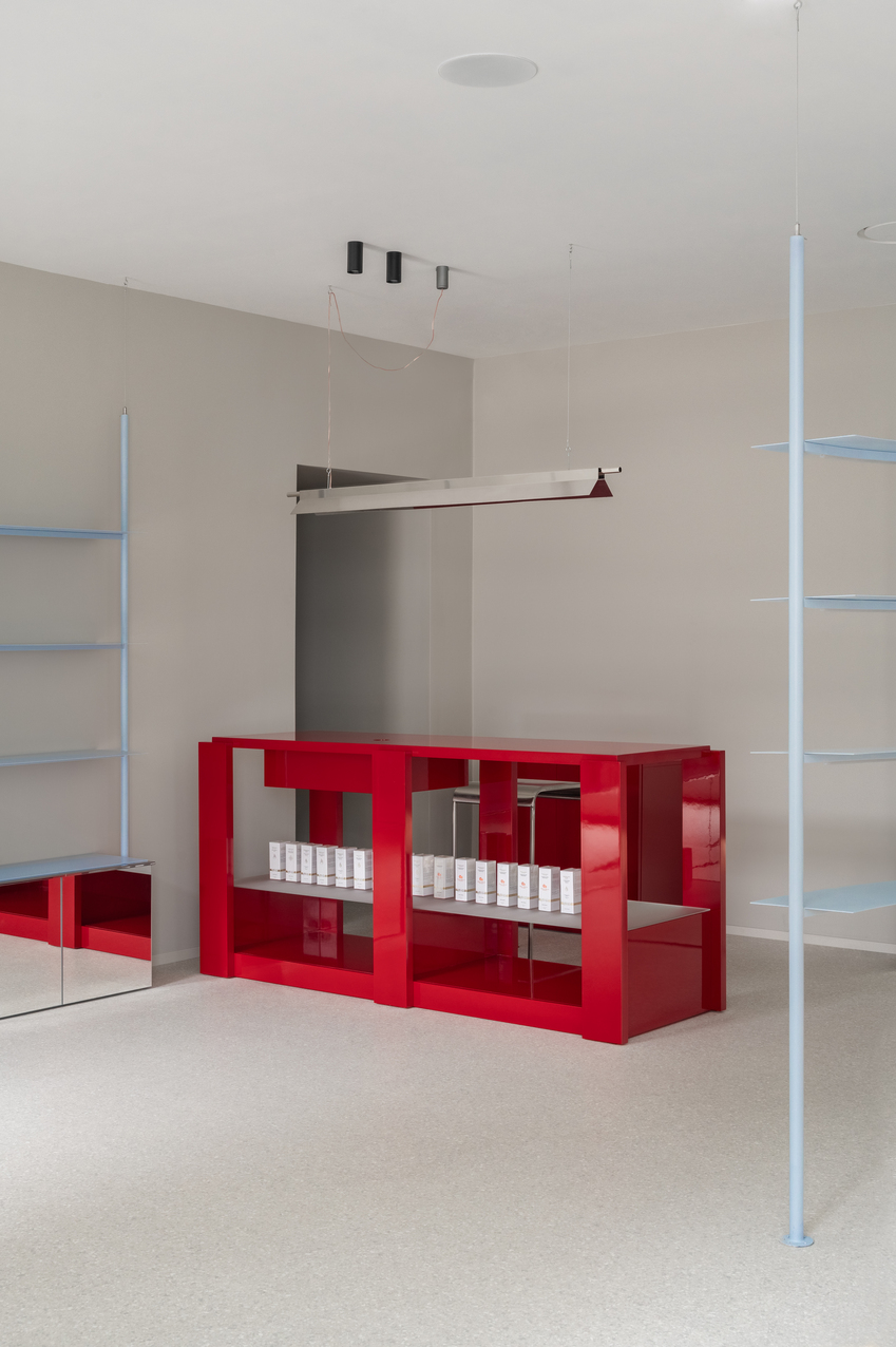 circular shelving units outline njoy sex shop's minimal interior in kyiv