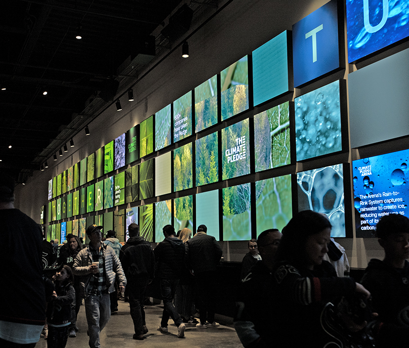400-foot installation turns climate pledge arena into a living environmental interface - 2