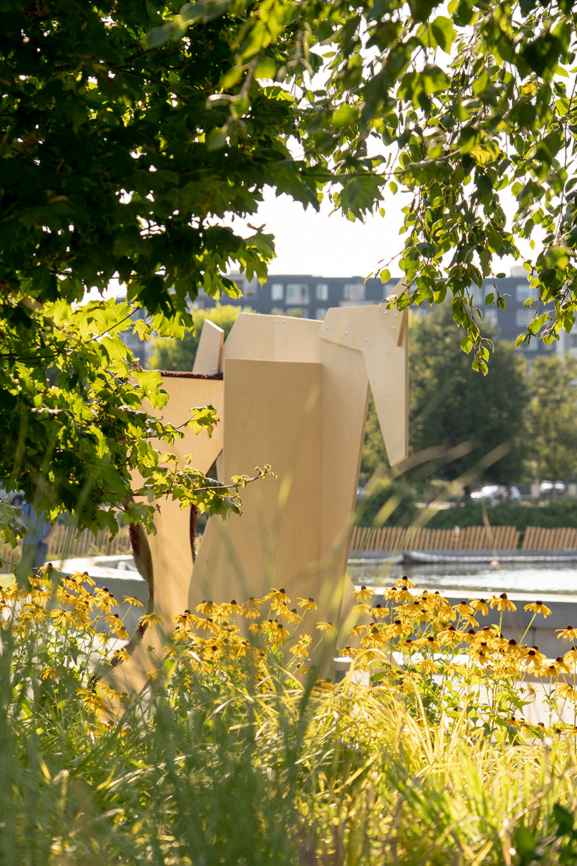 plywood horse doubles turn monument into public playground in seattle - 4