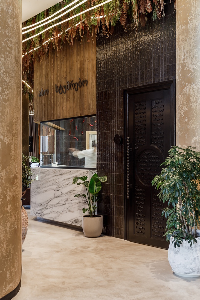 mamuli translates georgian culture and traditions into layered restaurant interior - 10