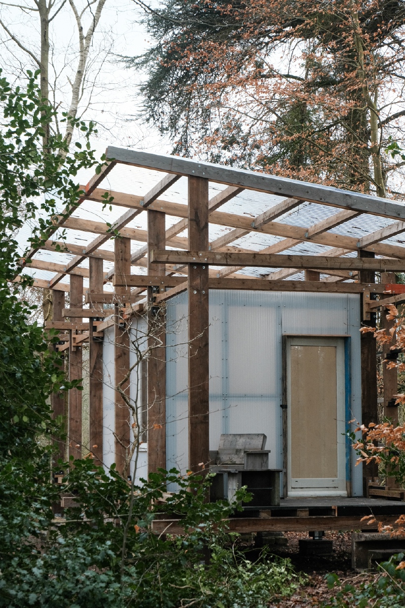 salvaged materials compose studio-method's new hub for art and ecology in dutch forest