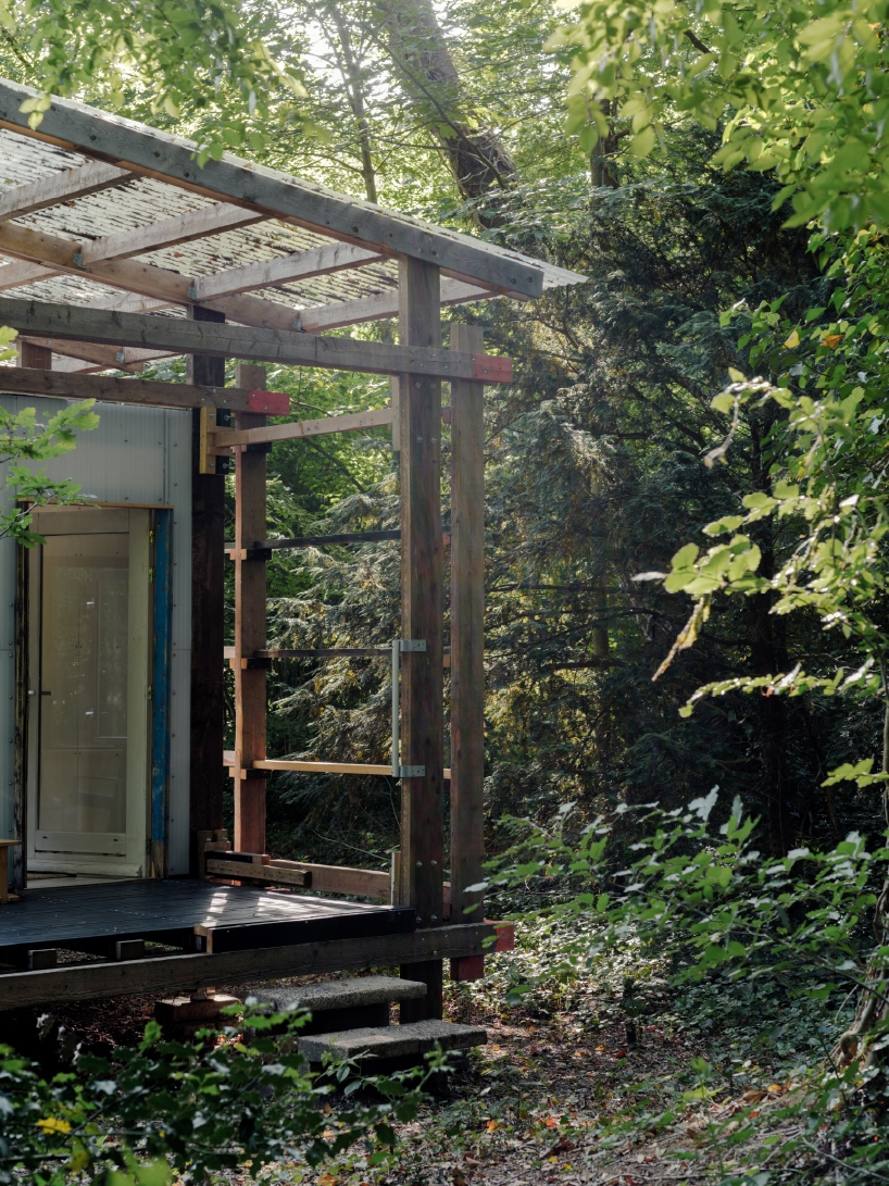 salvaged materials compose studio-method's new hub for art and ecology in dutch forest