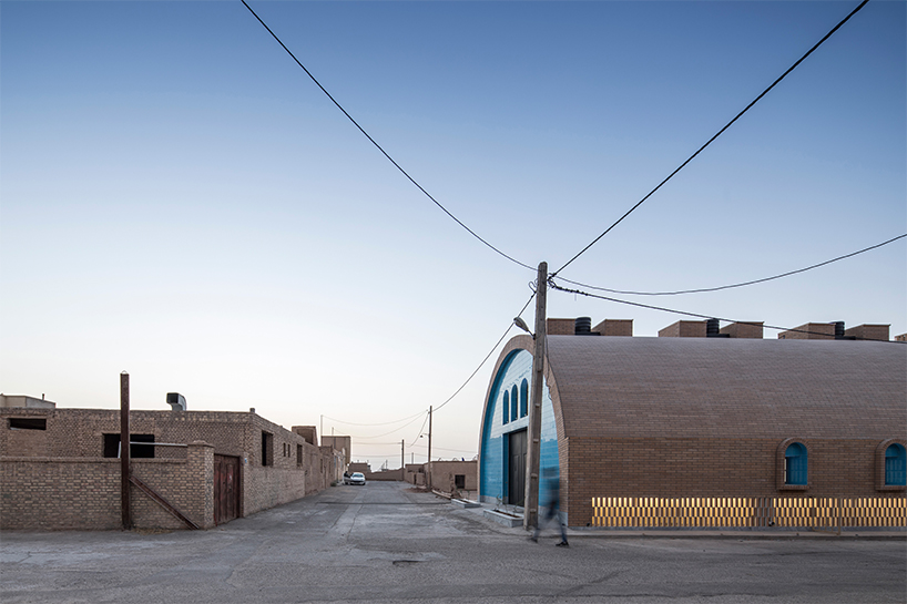 brick and turquoise tiles clad vaulted aghajoon communal kitchen in iran