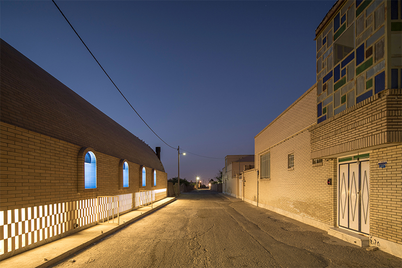 brick and turquoise tiles clad vaulted aghajoon communal kitchen in iran