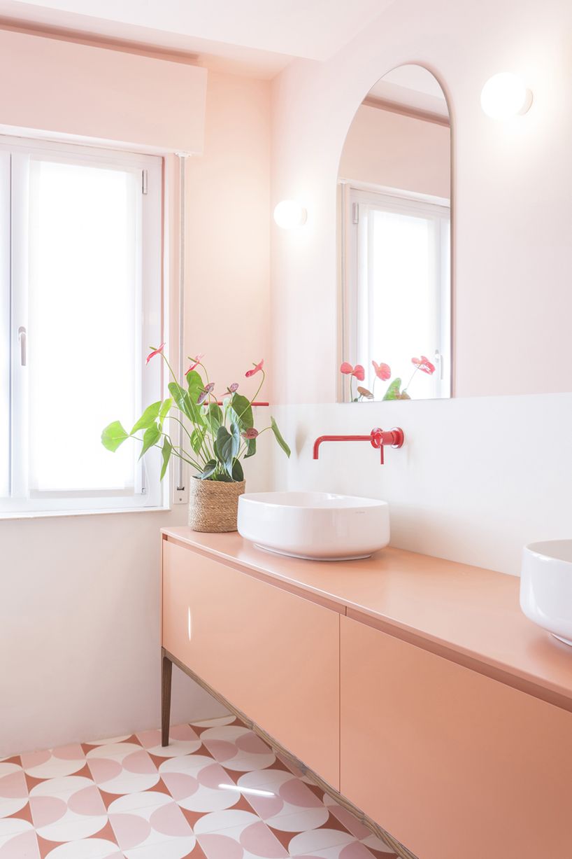 pop colors animate geometric interiors within renovated 1960s apartment in italy - 11