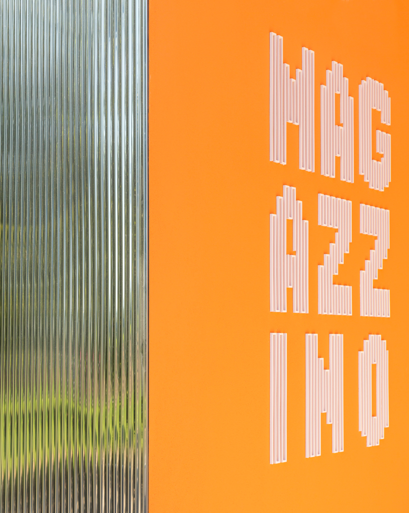 mirrored aluminum facade blurs distretto solidale social space into the italian landscape - 8