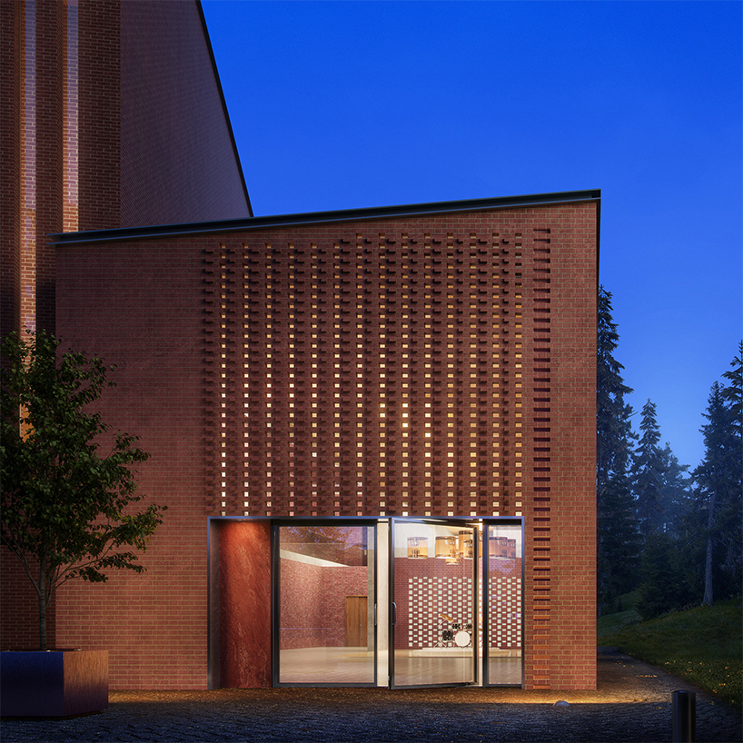 perforated brick facade encloses north musical art center in säynätsalo, finland