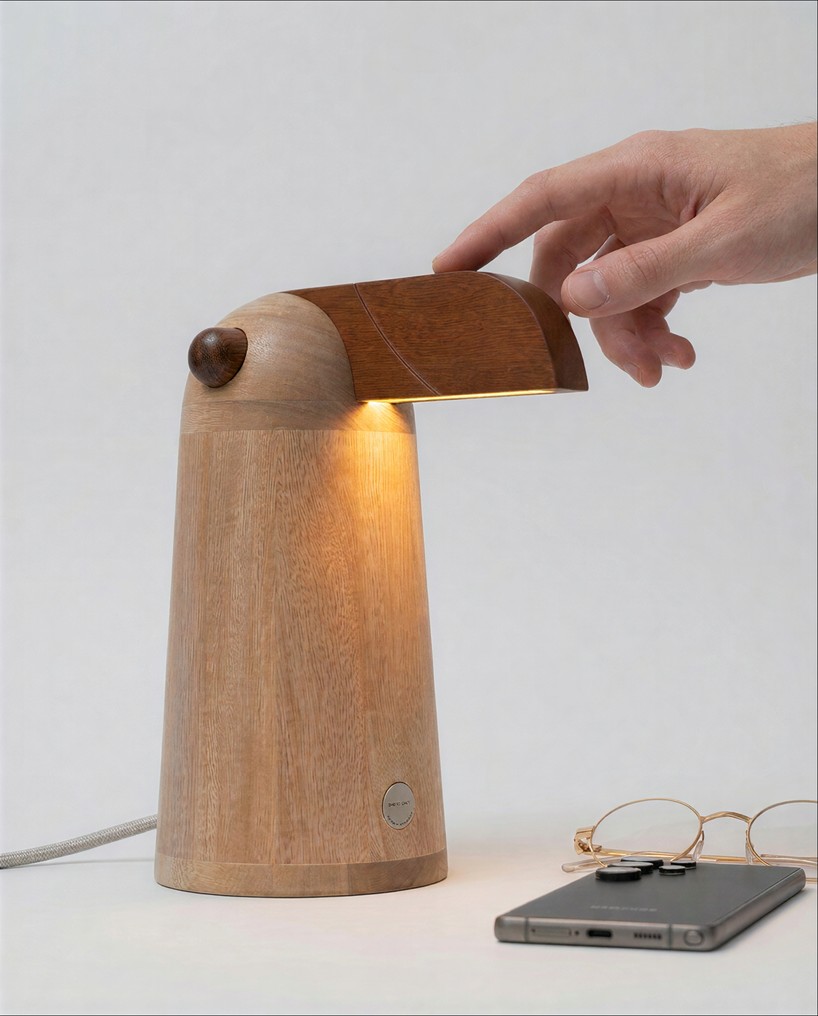 crafted from dual-tone solid oak, TUPI lamp by estudio gris resembles bird at rest - 7