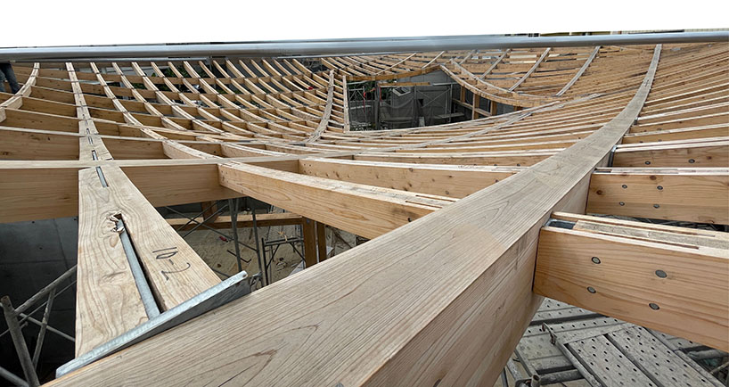Hyperbolic Roof Taiwan is made up of curved timber slats top concrete residence