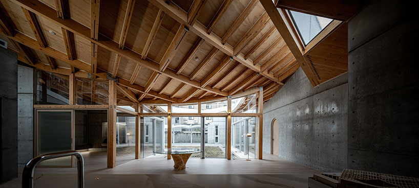 Hyperbolic Roof Taiwan is made up of curved timber slats top concrete residence
