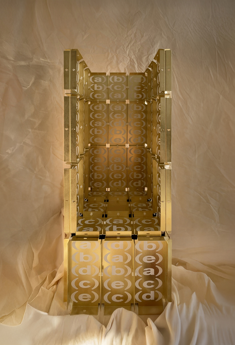 letters printed across brass chair turn mathematical paradox into NYC political commentary