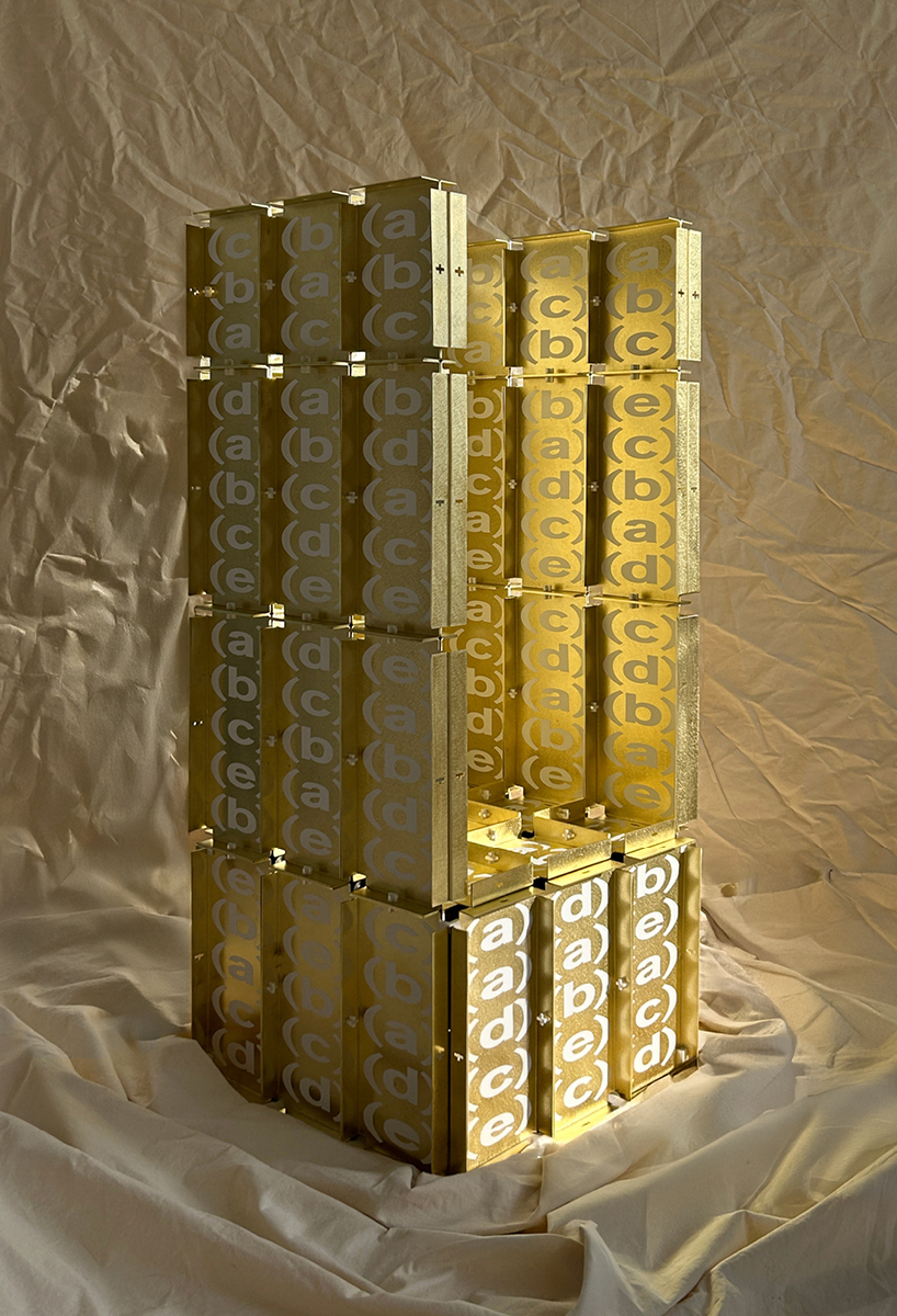 letters printed across brass chair turn mathematical paradox into NYC political commentary