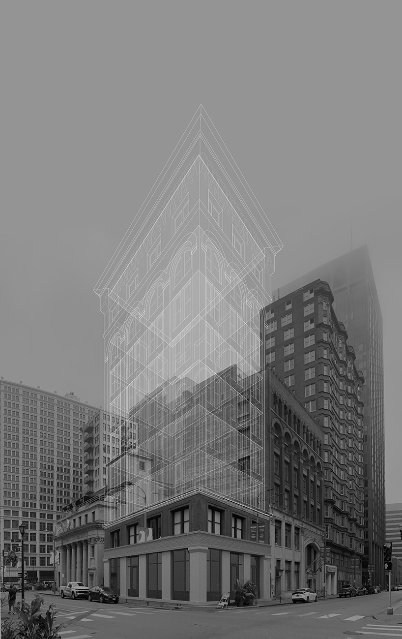 perforated metal panels clad office floating above st. louis's century-old columbia building