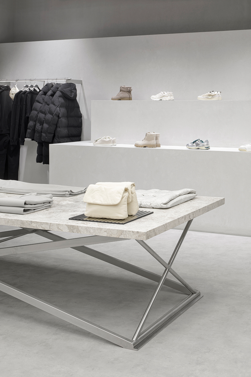 backlit metallic grid illuminates zara's hybrid retail space in rotterdam