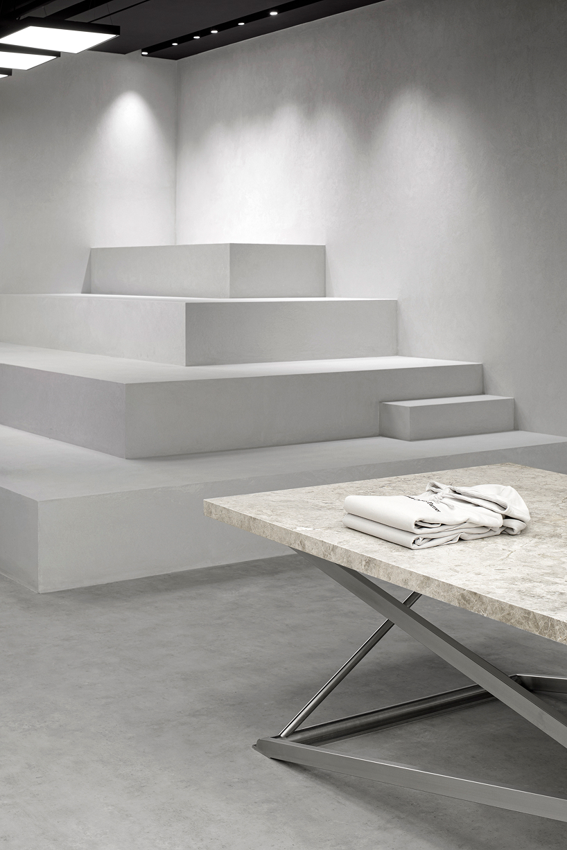 backlit metallic grid illuminates zara's hybrid retail space in rotterdam