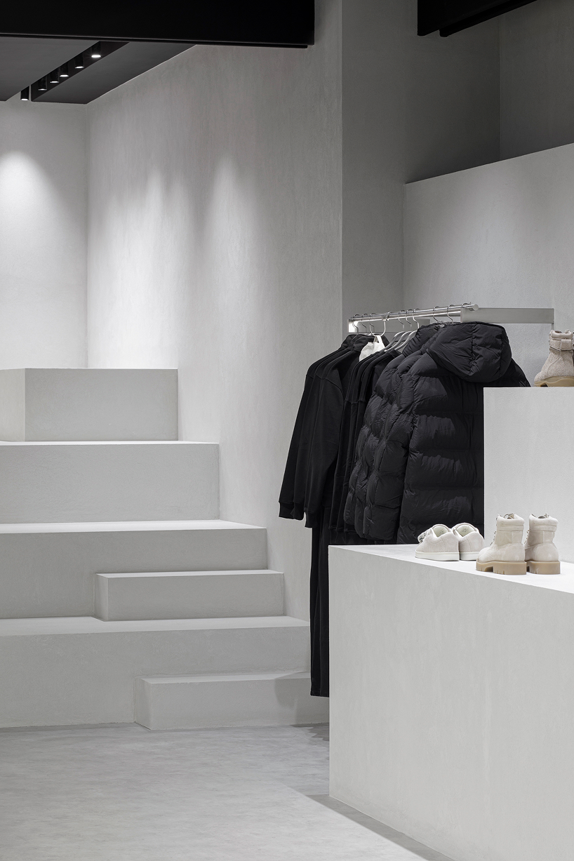 backlit metallic grid illuminates zara's hybrid retail space in rotterdam