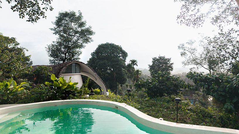 organic shell roof made of thatch and mud tops sculptural eco-retreat in india