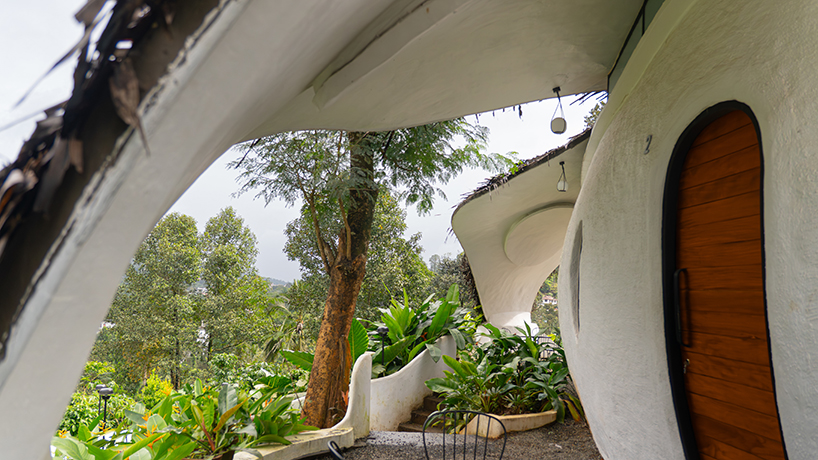 organic shell roof made of thatch and mud tops sculptural eco-retreat in india