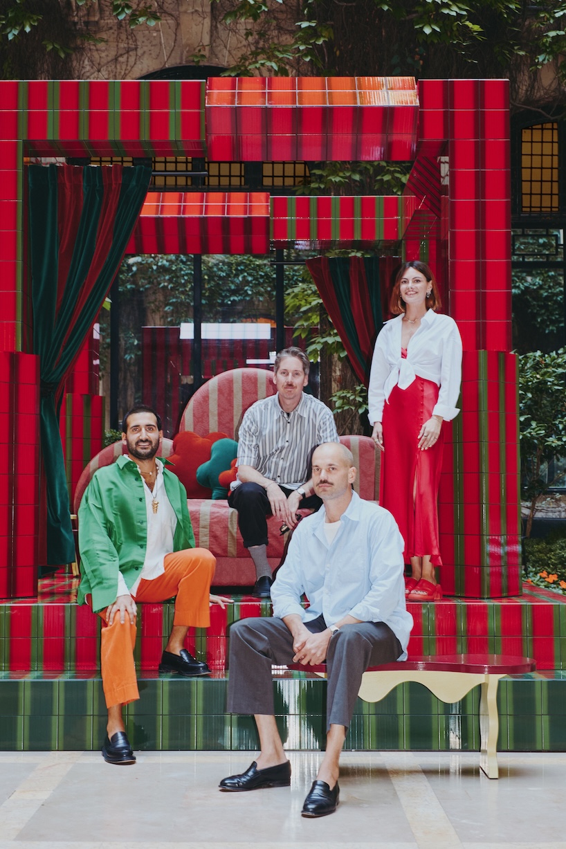 green and red ceramic tiles clad sculptural daybed by uchronia at hôtel plaza athénée, paris