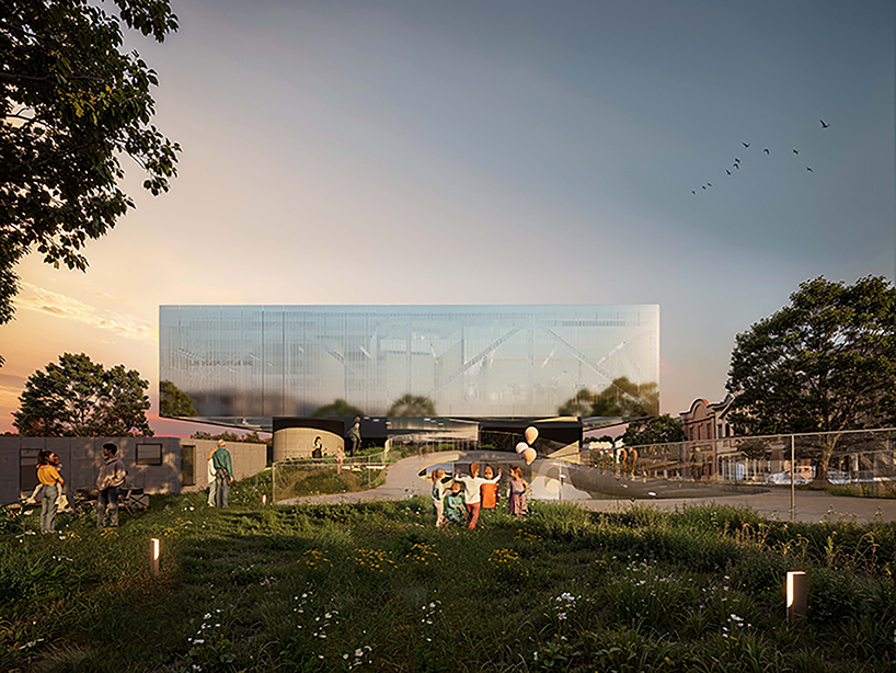 reflective metal facade wraps another side funeral home&rsquo;s elevated volume in san francisco