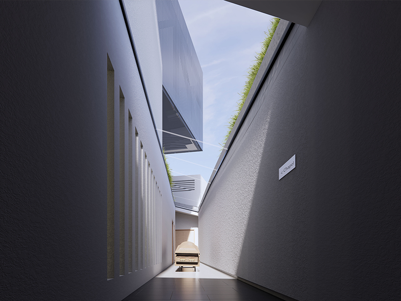 reflective metal facade wraps another side funeral home&rsquo;s elevated volume in san francisco