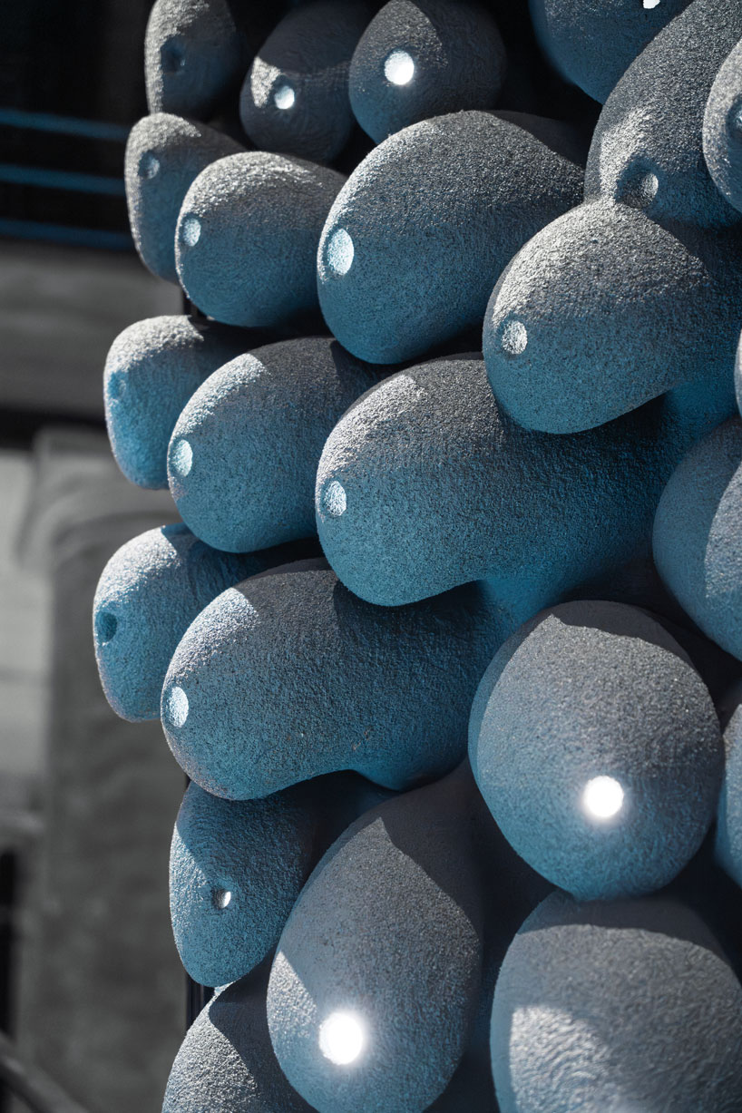 recycled 3D printed rooftop homes explore adaptable urban living at 2025 venice biennale