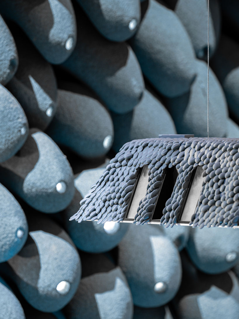 recycled 3D printed rooftop homes explore adaptable urban living at 2025 venice biennale