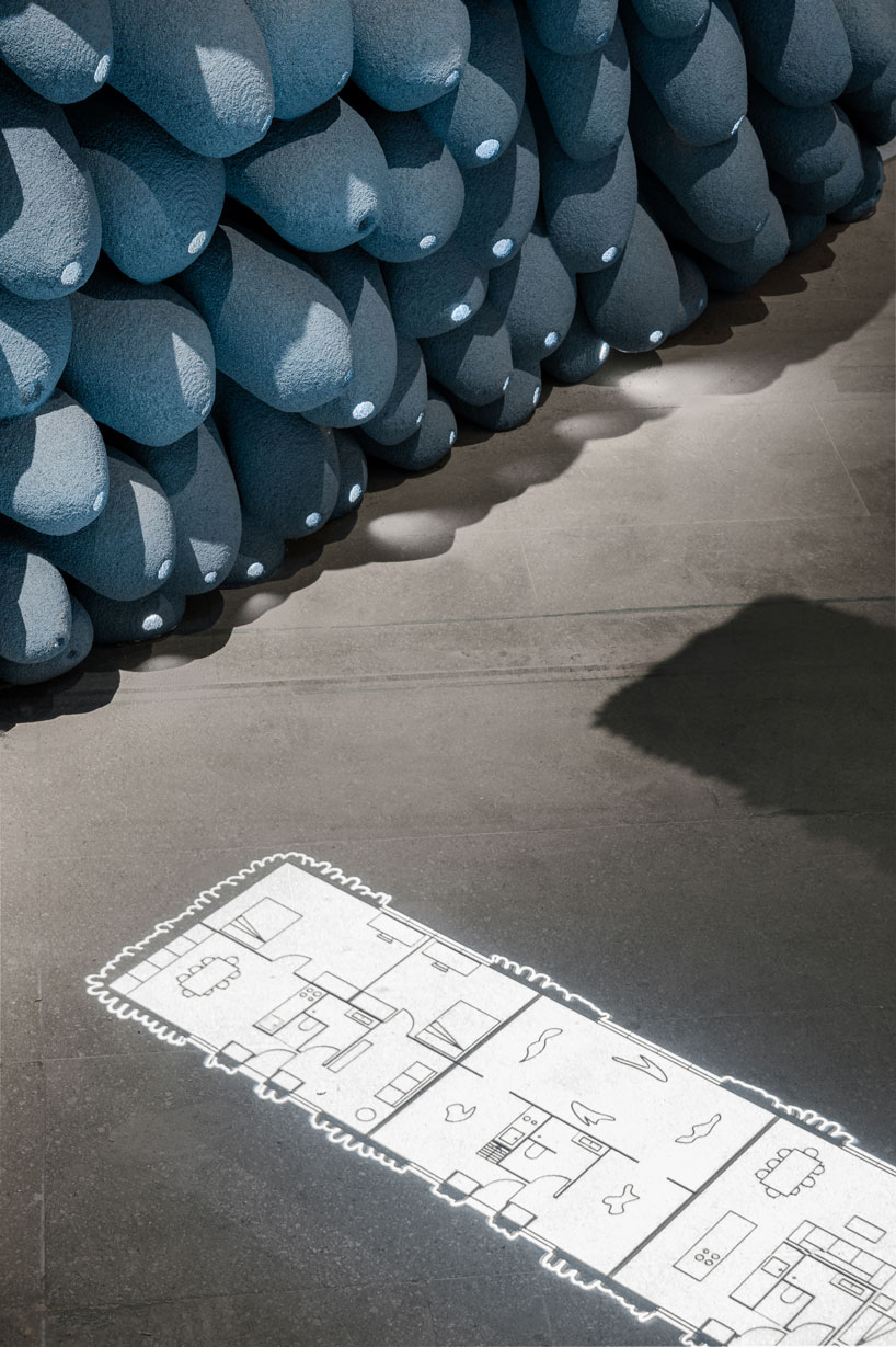 recycled 3D printed rooftop homes explore adaptable urban living at 2025 venice biennale