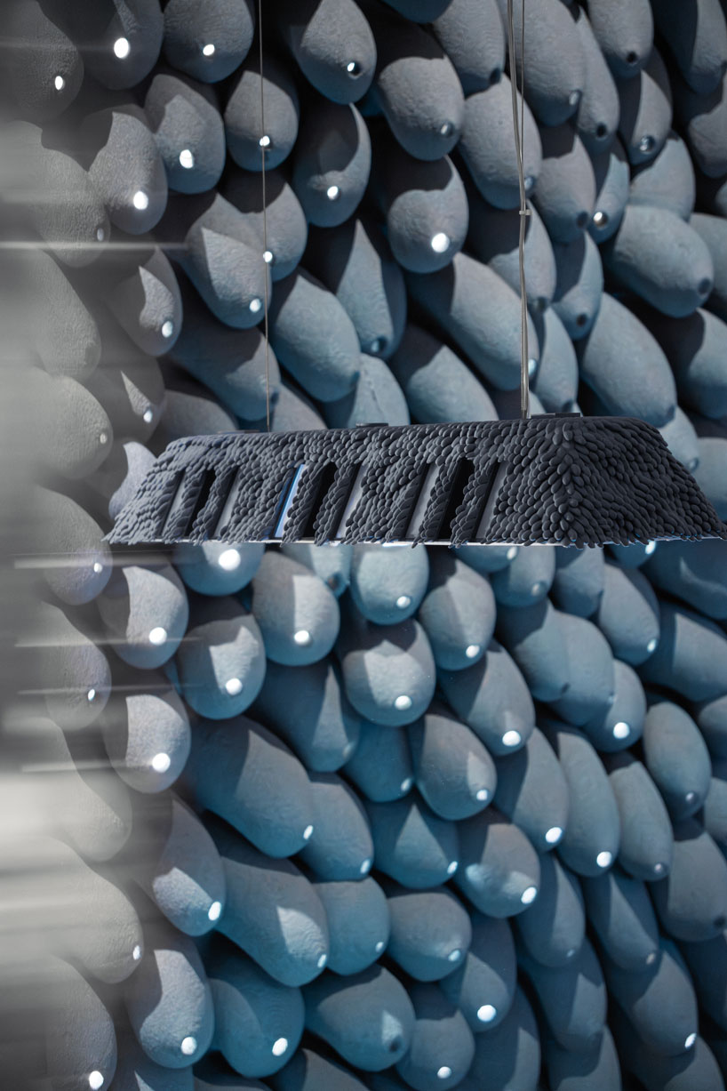 recycled 3D printed rooftop homes explore adaptable urban living at 2025 venice biennale