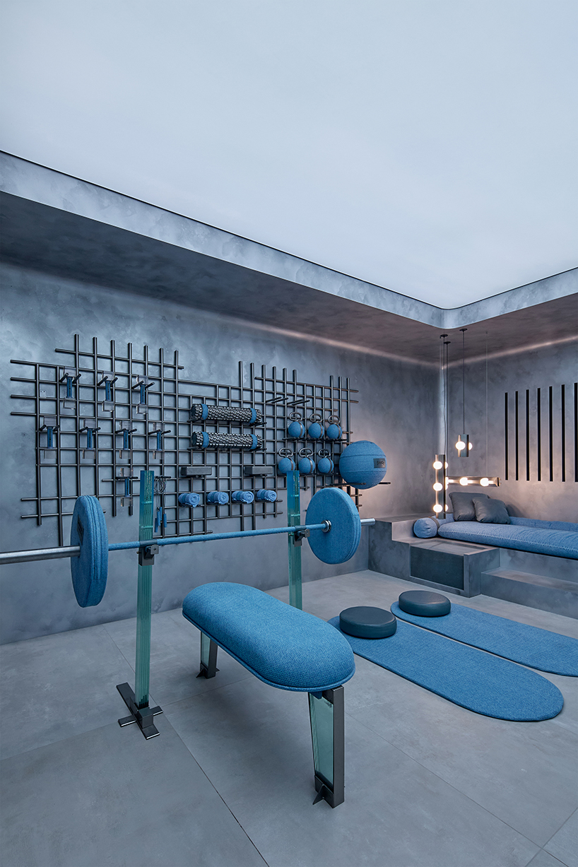 denim wraps workout equipment within sutura sculptural gym in mexico