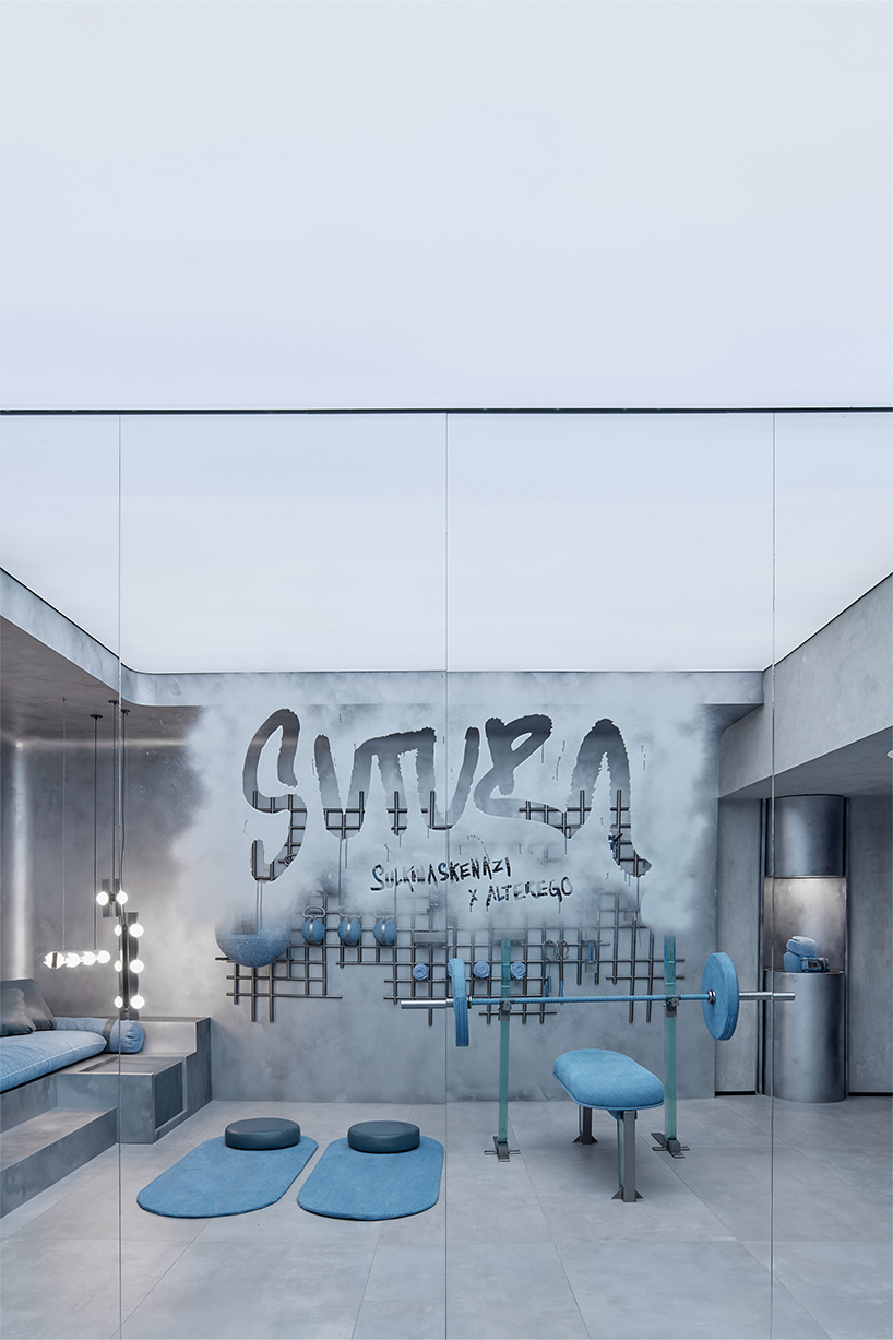 denim wraps workout equipment within sutura sculptural gym in mexico