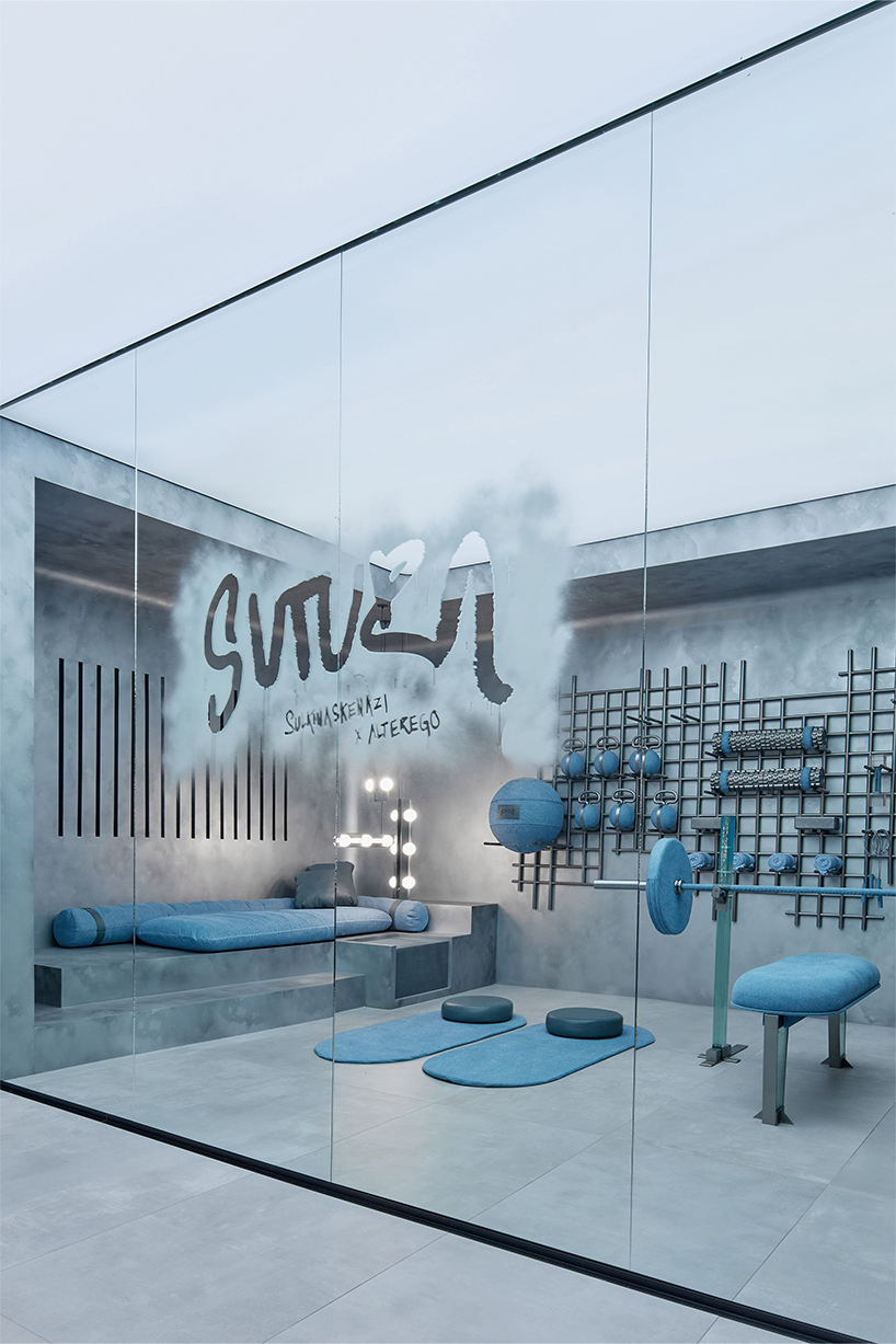 denim wraps workout equipment within sutura sculptural gym in mexico